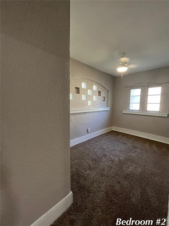 3303 West Empedrado Street, Unit 1 Tampa, FL 33629 - Photo 14 of 16 an empty room with a empty space and window