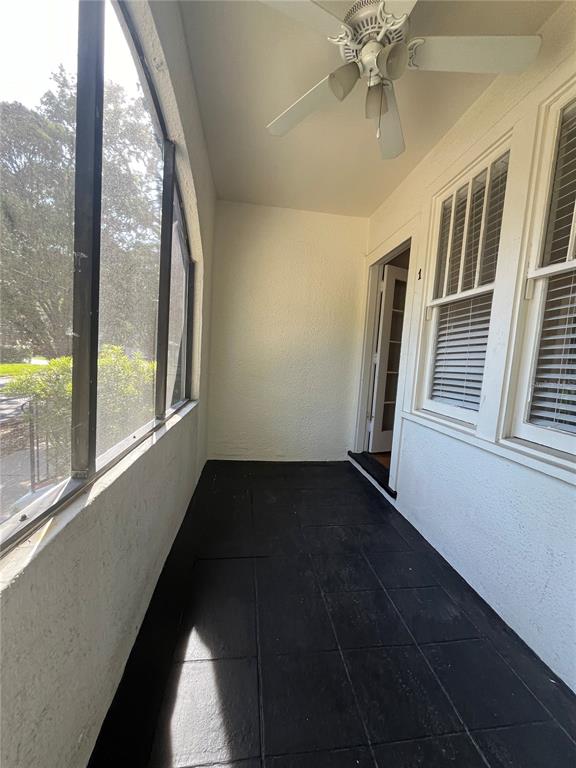 3303 West Empedrado Street, Unit 1 Tampa, FL 33629 - Photo 16 of 16 wooden floor in an empty room with a window