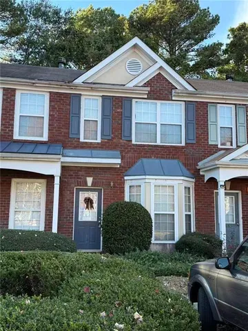a front view of a house with balcony
