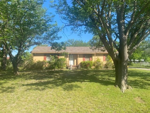 3913 Hickox Road Rowlett, TX 75089 - Photo 1 of 1 a view of a house with a yard