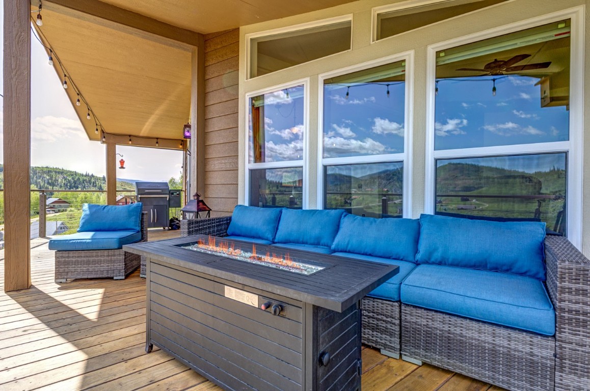 26870 Beaver Canyon Drive Clark, CO 80428 - Photo 22 of 50 a view of a rooftop deck with couch