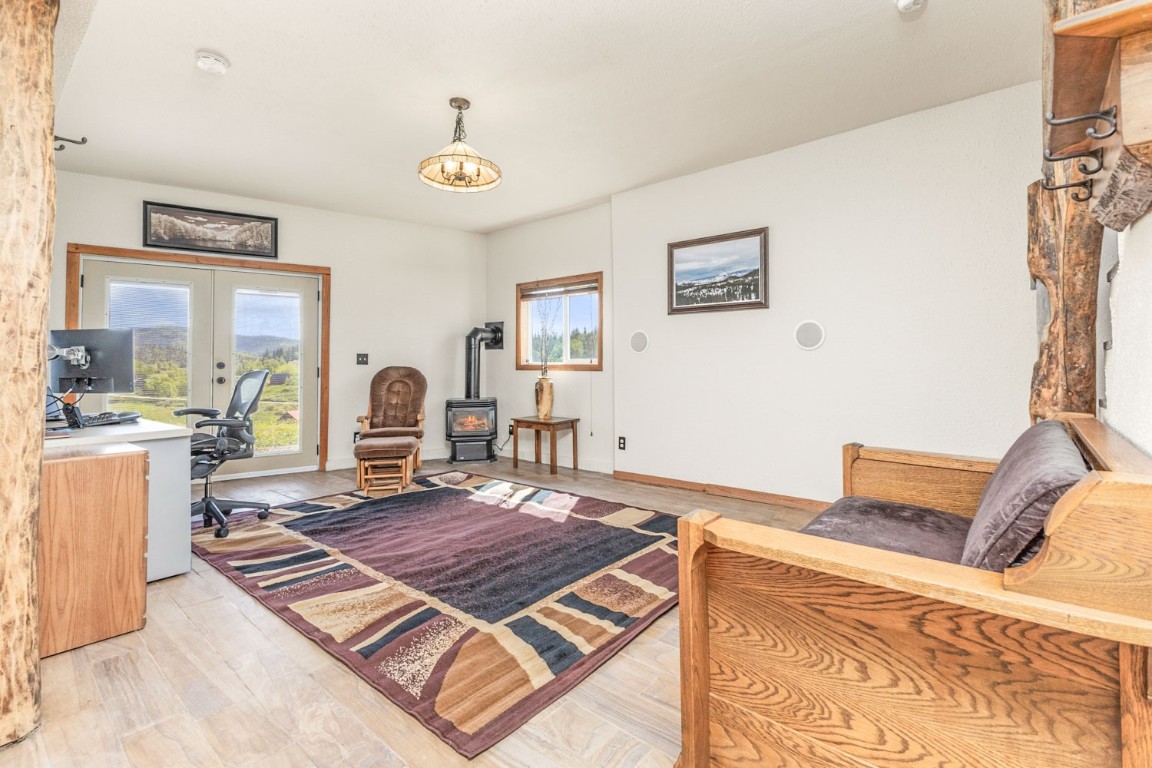 26870 Beaver Canyon Drive Clark, CO 80428 - Photo 38 of 50 a living room with furniture and a table
