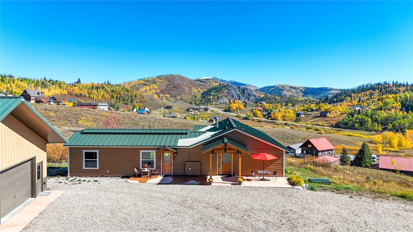 26870 Beaver Canyon Drive Clark, CO 80428 - Photo 7 of 50 outdoor view of house with outdoor space and seating area