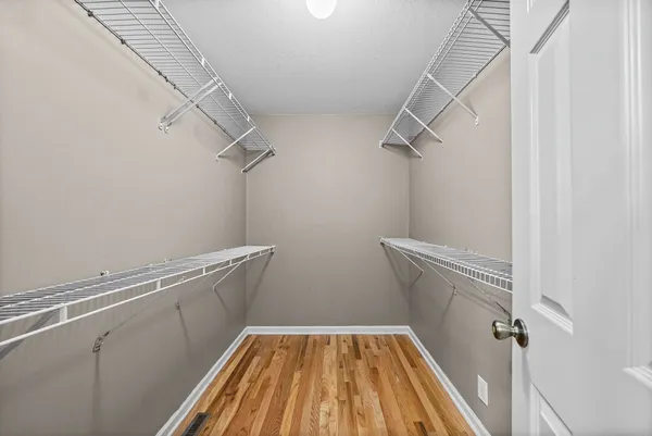 a view of a room with racks on the wall