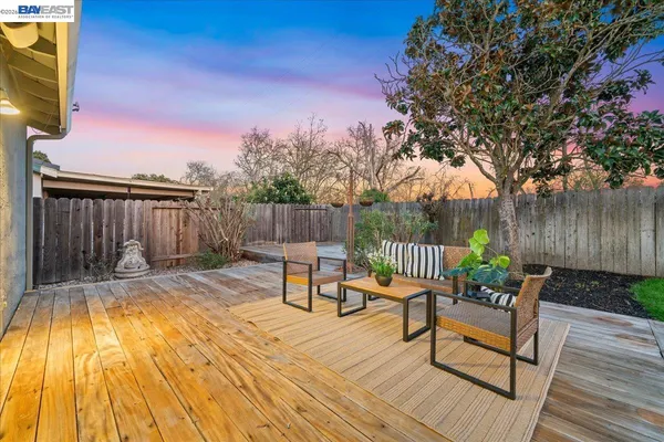 an aerial view of houses with yard