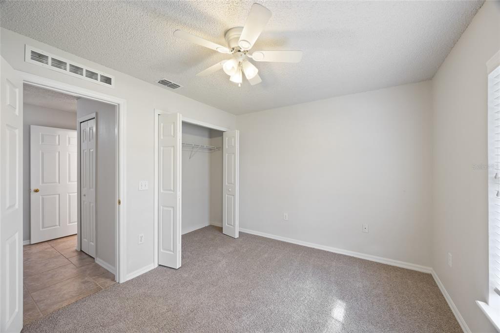 1009 Stratton Avenue Spring Hill, FL 34609 - Photo 16 of 29 wooden floor in an empty room