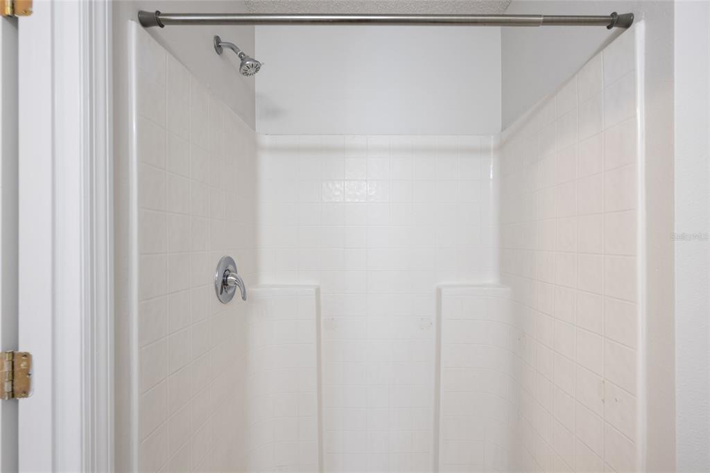 1009 Stratton Avenue Spring Hill, FL 34609 - Photo 10 of 29 a bathroom with a shower