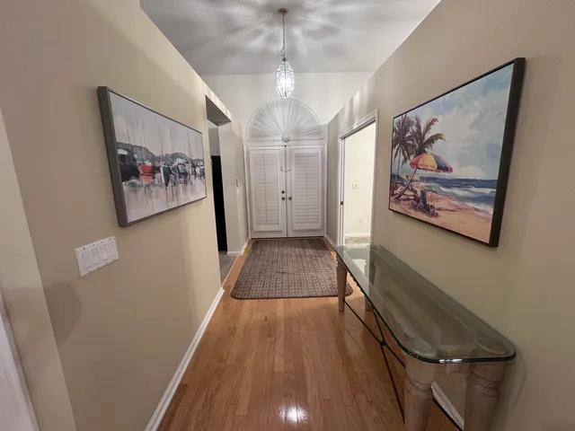 a view of gallery with wooden floor