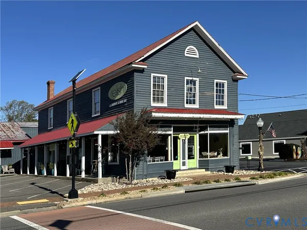 a front view of a building with street view