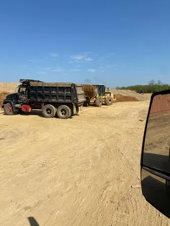 a view of a swimming pool and an outdoor space