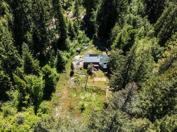 8245 Jumpoff Joe Creek Road Grants Pass, OR 97526 - Photo 6 of 43 a aerial view of a house with a yard