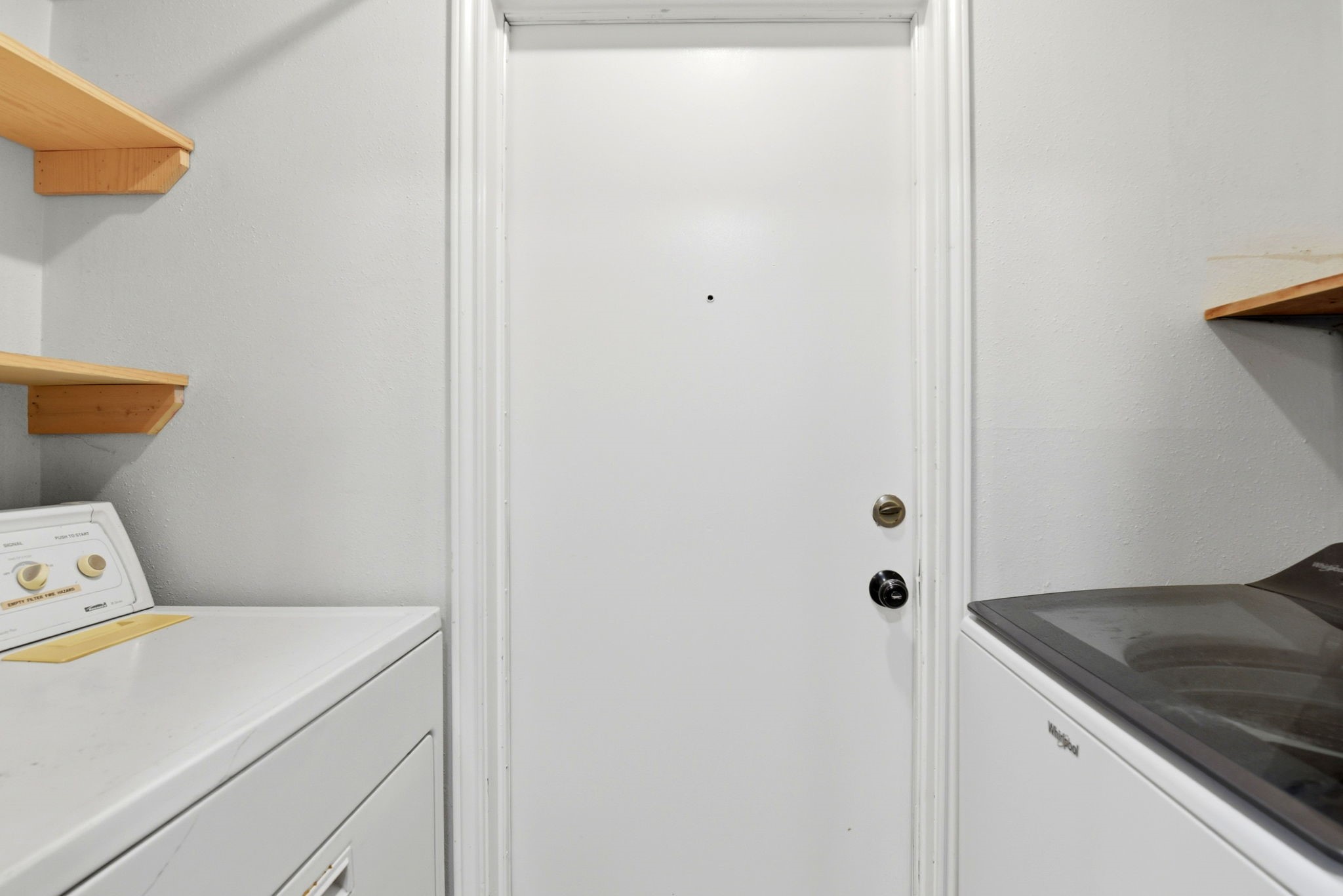 21330 Golden Dove Drive Spring, TX 77388 - Photo 24 of 29 Say goodbye to laundromat trips! A dedicated indoor utility room keeps your laundry and cleaning supplies tidy and out of sight.