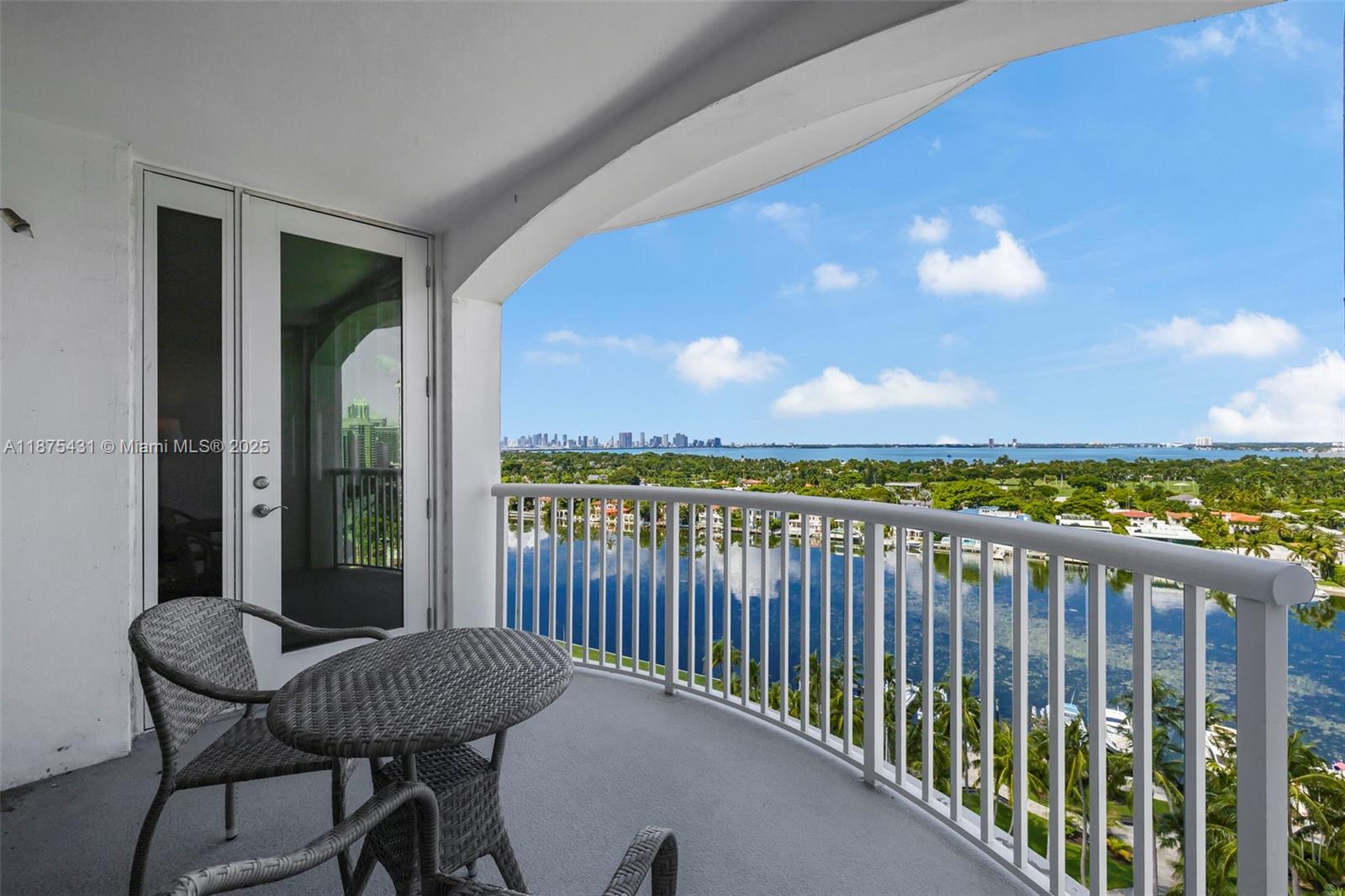 5401 Collins Avenue, Unit 1231 Miami Beach, FL 33140 - Photo 13 of 43 a view of a balcony with furniture