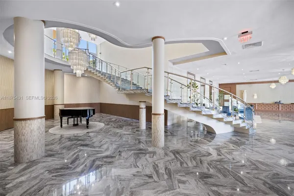 a view of a living room and a balcony