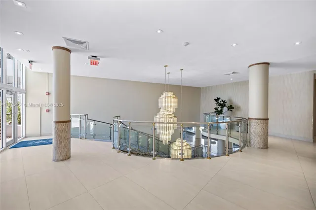 a view of a living room and a balcony