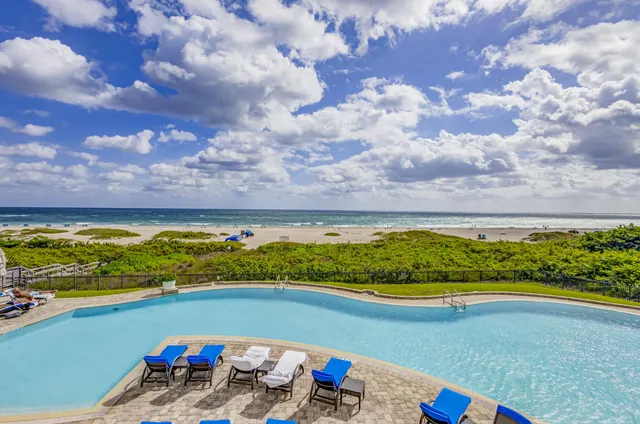 a view of swimming pool with ocean view