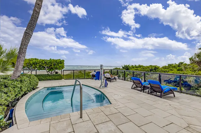 a view of a terrace with sitting area