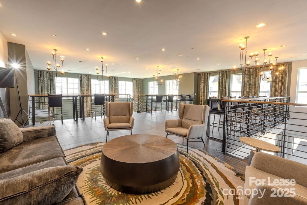 3110 Doe River Way, Unit CHADWICK Matthews, NC 28105 - Photo 31 of 48 a living room with furniture and a rug
