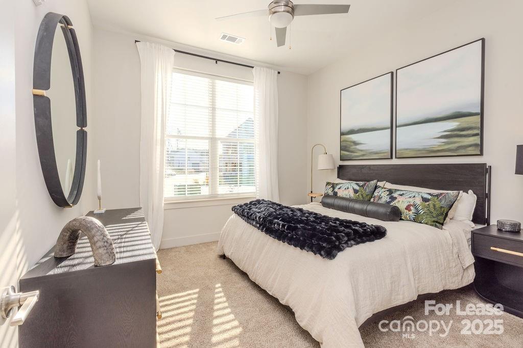 3110 Doe River Way, Unit CHADWICK Matthews, NC 28105 - Photo 41 of 48 a bedroom with bed and window