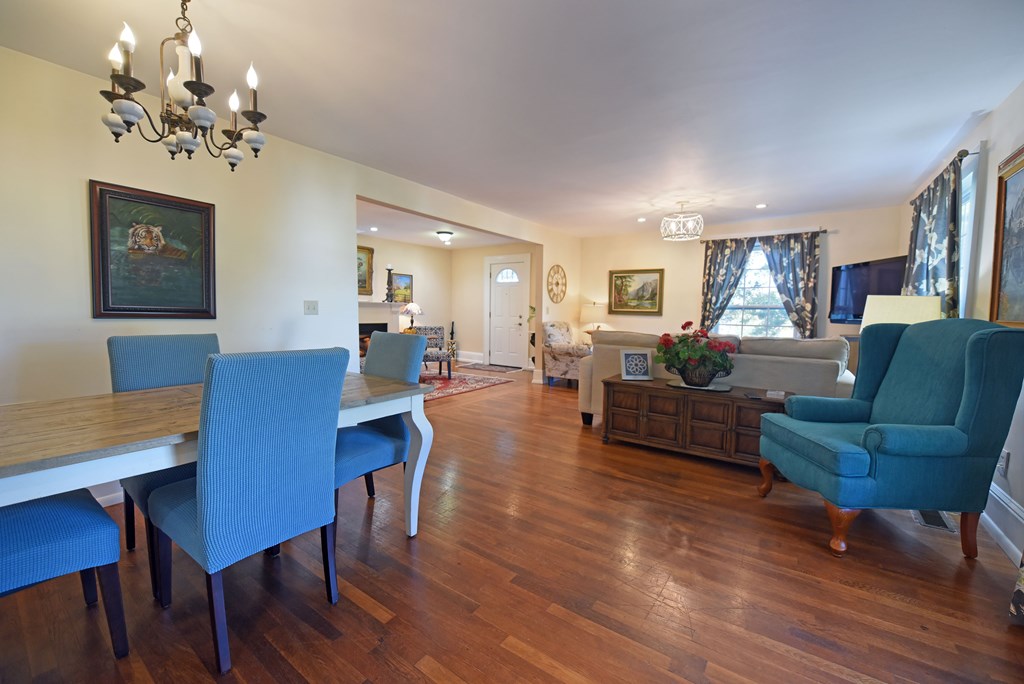 63 Loving Road Morganton, GA 30560 - Photo 31 of 58 a living room with furniture kitchen view and a dining table