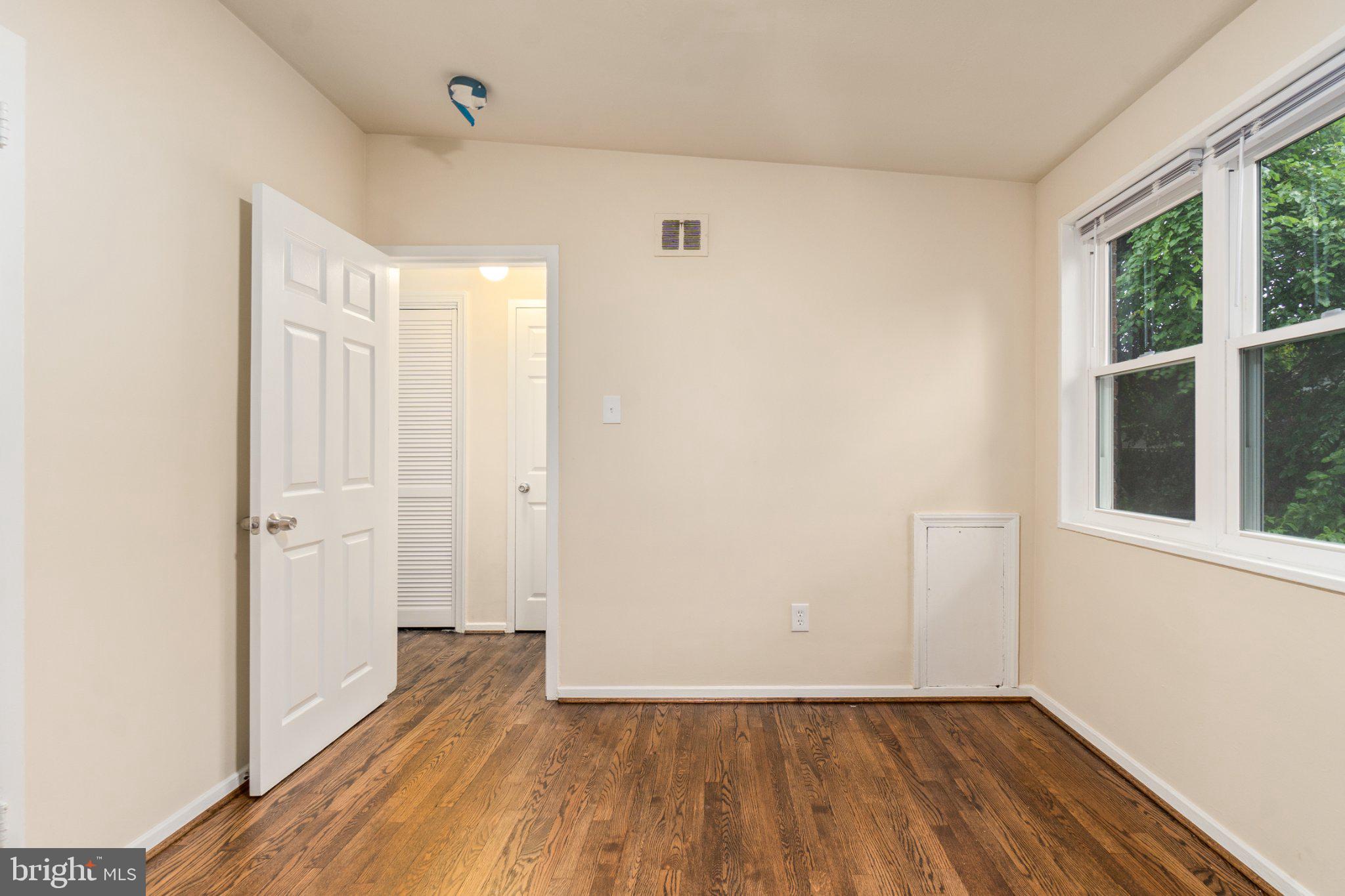 1029 Quebec Terrace, Unit 8 Silver Spring, MD 20903 - Photo 18 of 21 Bright and airy room with hardwood floors.