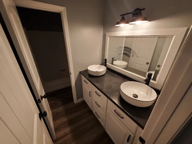 a bathroom with a toilet and a sink