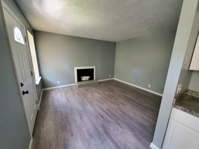 a refrigerator freezer sitting inside of a kitchen