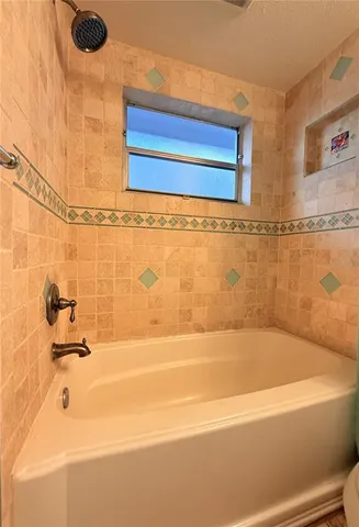 a bathroom with a bathtub