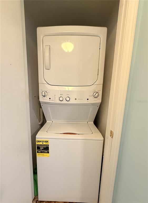 4221 Touchton Place, Unit 4221 New Port Richey, FL 34652 - Photo 35 of 37 a utility room with dryer and washer