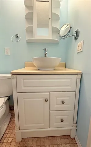 a close view of a sink and a mirror