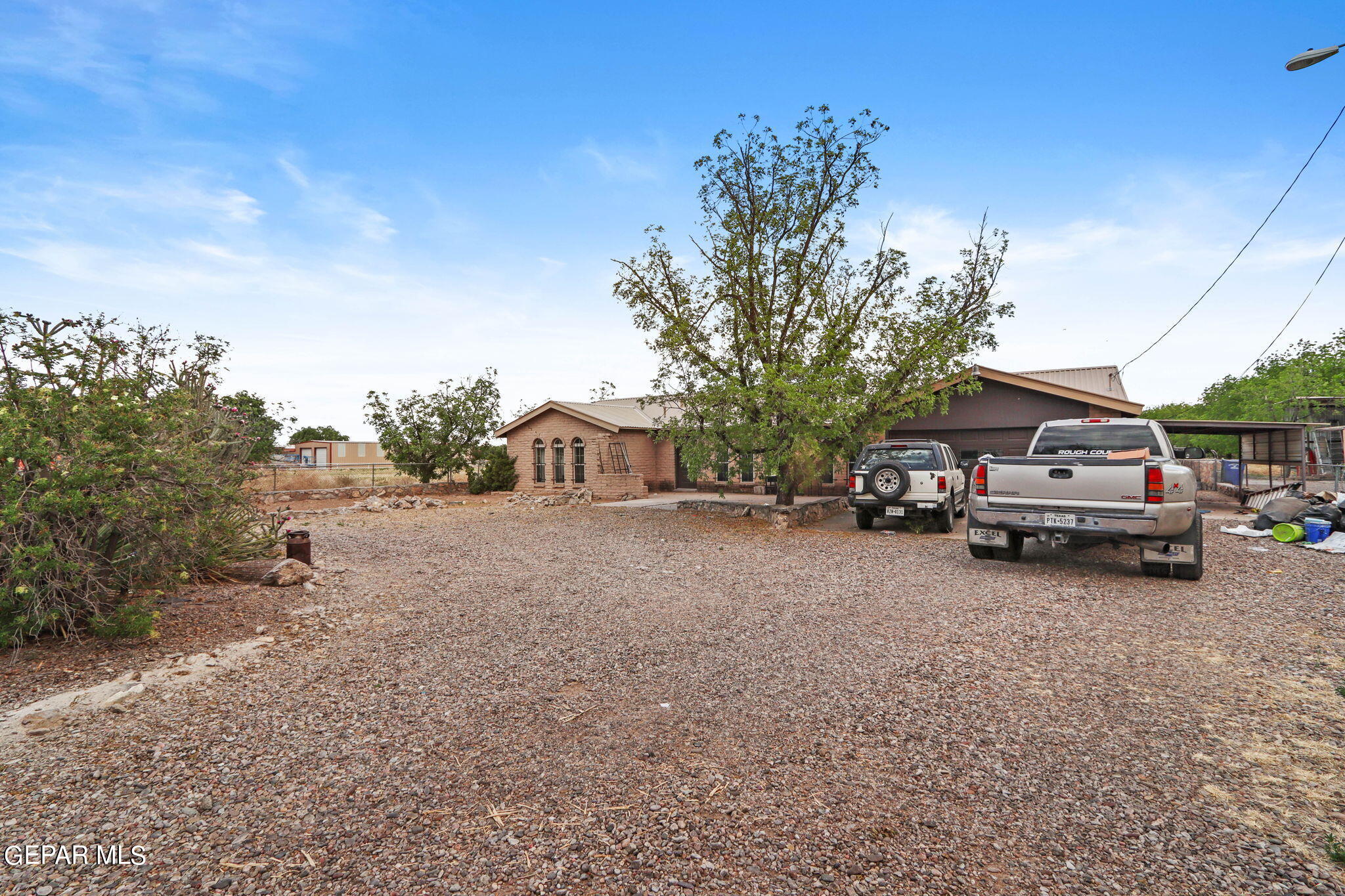 3025-3035 West O'Hara Road Anthony, NM 88021 - Photo 20 of 41 a view of a car parked on the side of the road