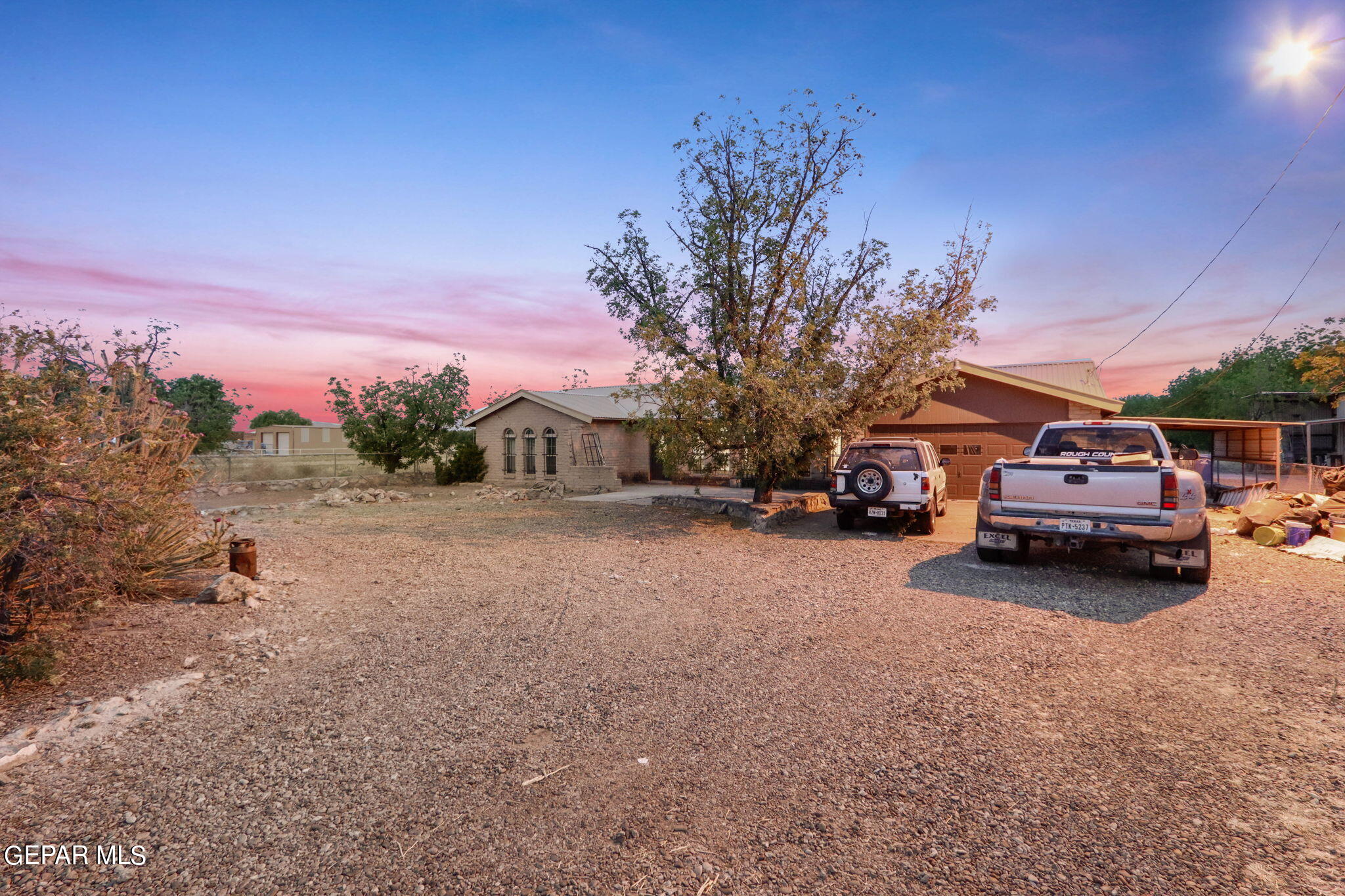 3025-3035 West O'Hara Road Anthony, NM 88021 - Photo 25 of 41 a view of a car parked on the side of the road