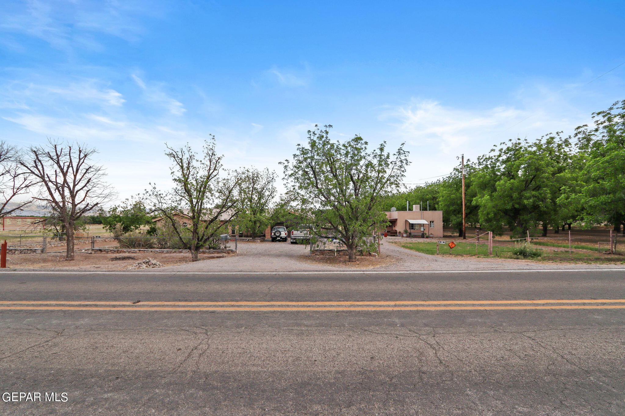 3025-3035 West O'Hara Road Anthony, NM 88021 - Photo 26 of 41 a view of a town with palm trees