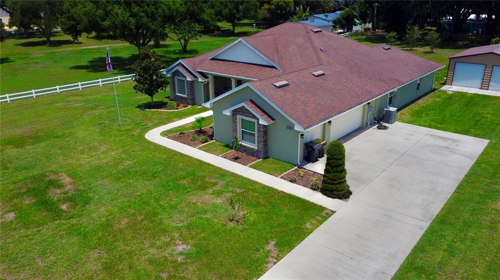 3934 Connersville Road Bartow, FL 33830 - Photo 63 of 81 a aerial view of a house with a yard porch and sitting area