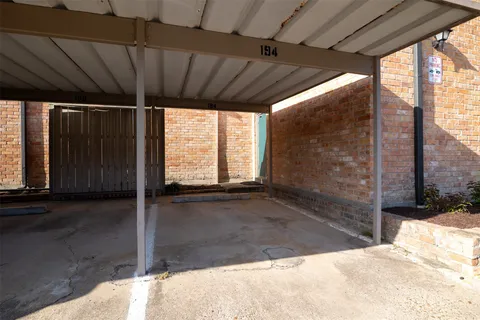 a view of balcony with wooden floor