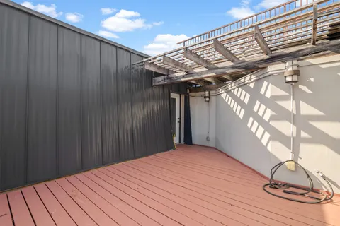 a view of a palm tree in front of a room