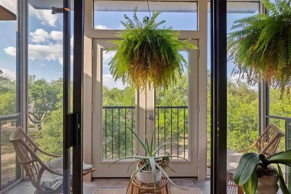 a view of a balcony with lake view