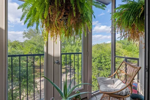 a front view of a house with yard and outdoor