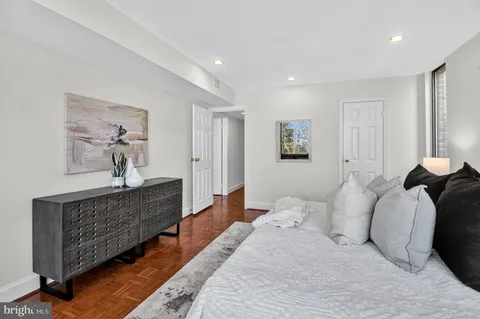 a bed room with furniture and a couch