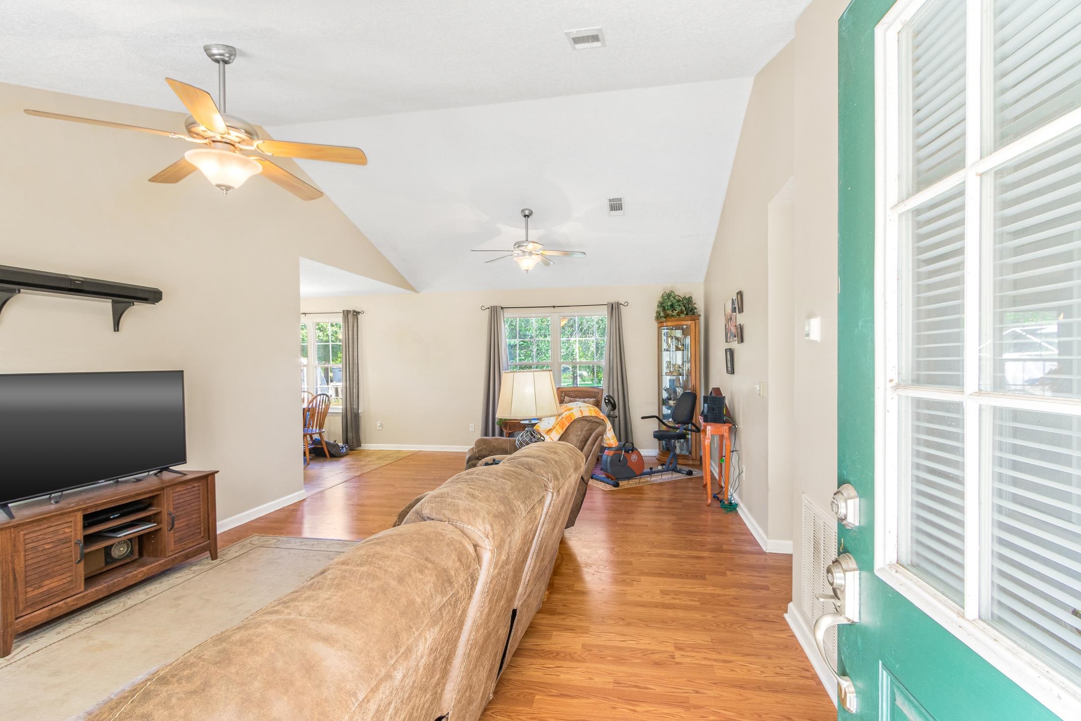 6632 Brown Road St. Augustine, FL 32095 - Photo 7 of 40 a living room with furniture and a flat screen tv