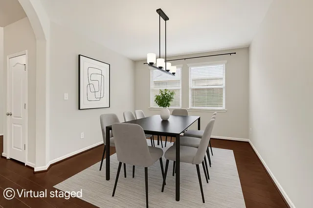 a large kitchen with stainless steel appliances granite countertop a stove a sink and a microwave