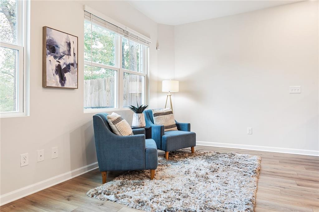 2824 Saratoga Lake View Decatur, GA 30034 - Photo 11 of 30 a living room with furniture and a window