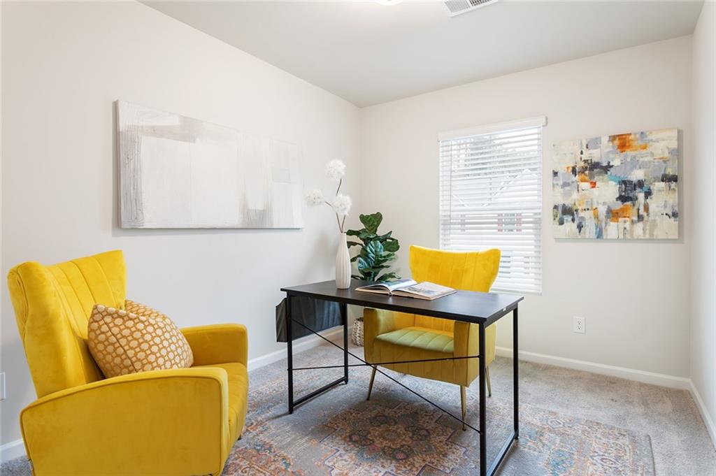 2824 Saratoga Lake View Decatur, GA 30034 - Photo 15 of 30 a living room with furniture and a potted plant