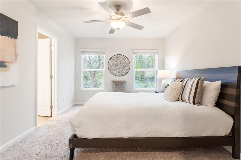 2824 Saratoga Lake View Decatur, GA 30034 - Photo 16 of 30 a large white bed in a small room