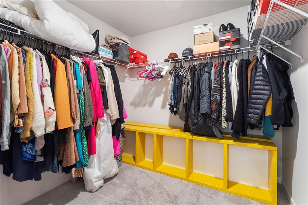 2824 Saratoga Lake View Decatur, GA 30034 - Photo 19 of 30 a view of walk in closet with clothes and shoes