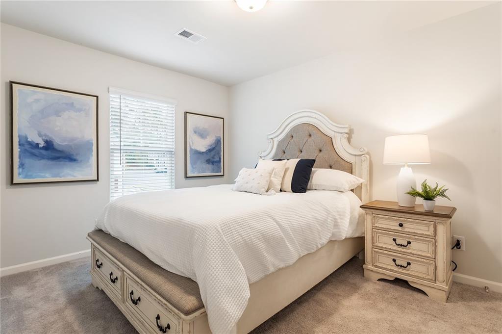 2824 Saratoga Lake View Decatur, GA 30034 - Photo 20 of 30 a bedroom with a bed and a dresser