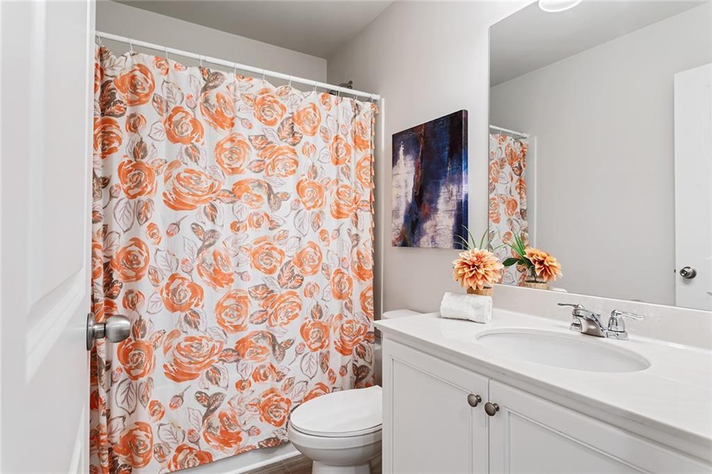 2824 Saratoga Lake View Decatur, GA 30034 - Photo 21 of 30 a bathroom with a sink and a mirror
