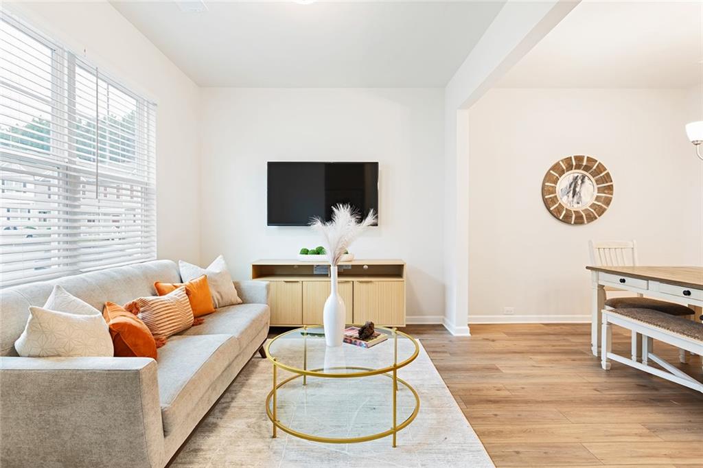 2824 Saratoga Lake View Decatur, GA 30034 - Photo 7 of 30 a living room with furniture and a flat screen tv