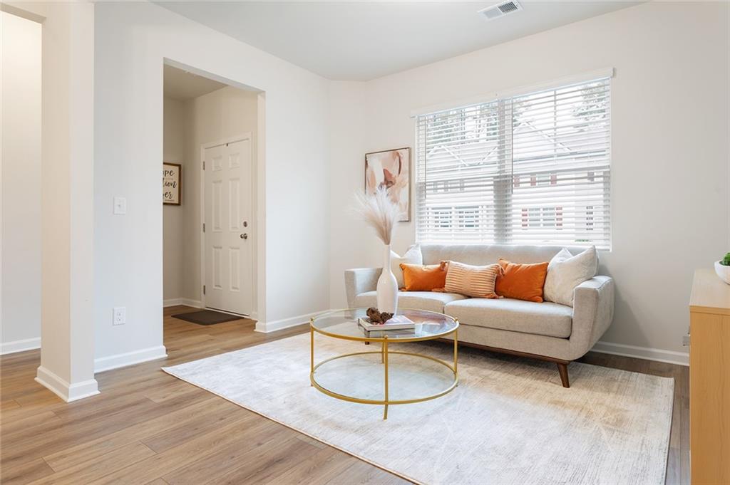 2824 Saratoga Lake View Decatur, GA 30034 - Photo 9 of 30 a living room with furniture and a window