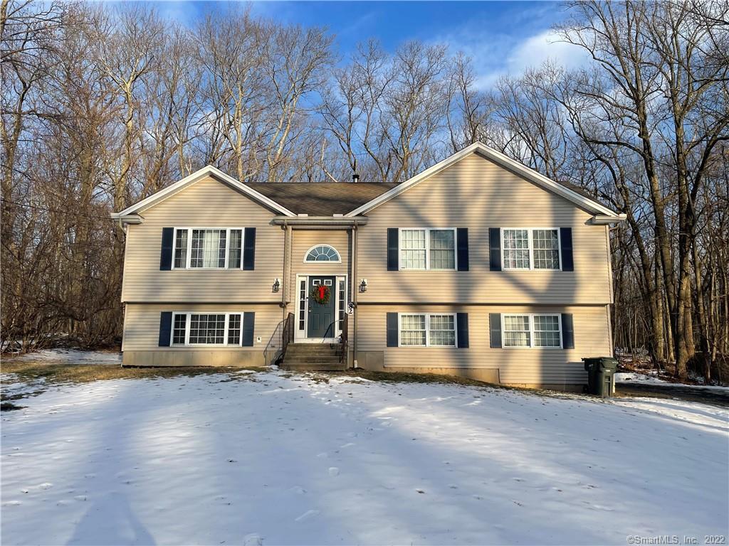 82 Plank Road Prospect, CT 06712 - Photo 1 of 1 a front view of a house with a yard